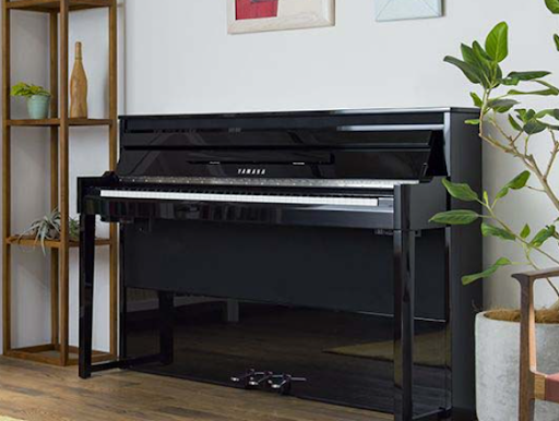 Đàn piano điện có giá thành mềm hơn piano cơ